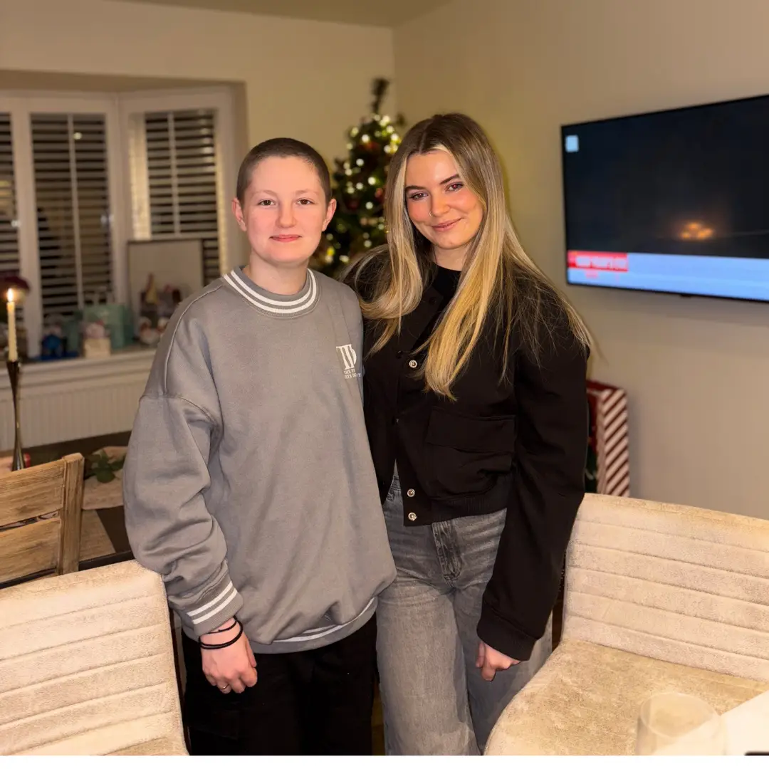 Ellie a TYA patient and her friend at Christmas